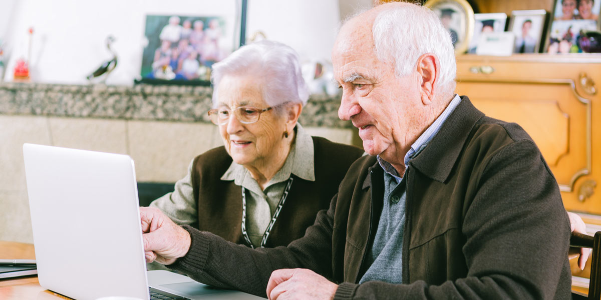 Couple looking at computer