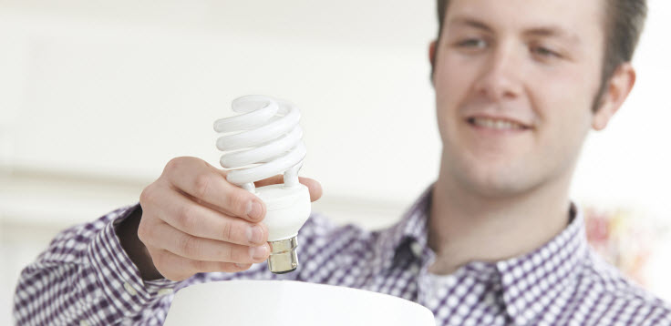 Man changing to new lightbulb